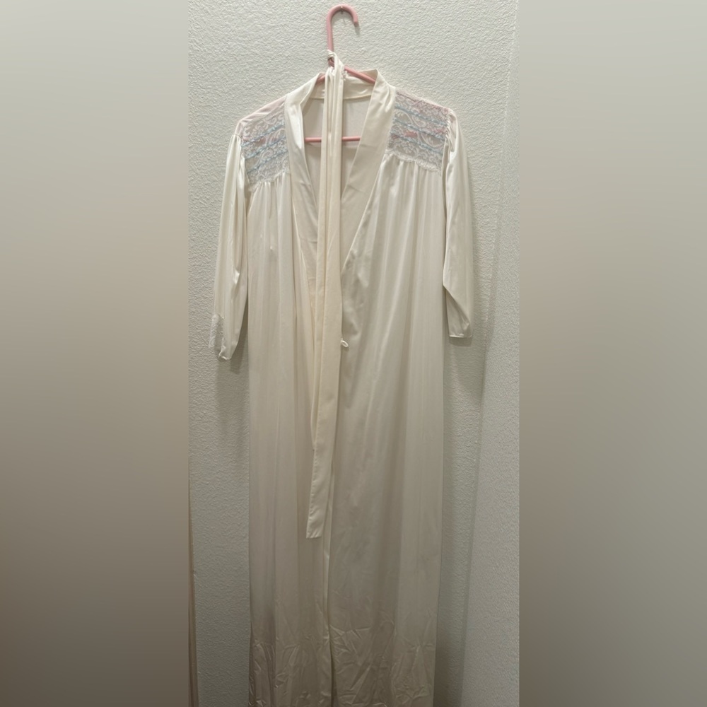 100% nylon robe in off white with blue lace accents on shoulder M